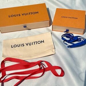 Louis Vuitton lot, two Louis Vuitton empty boxes, one Louis Vuitton dust bag